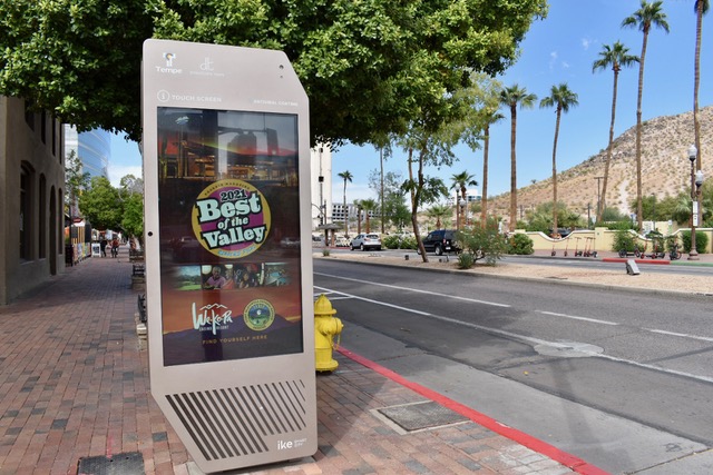 A digital kiosk from the company Interactive Kiosk Experience Smart Experience is erected on a downtown Tempe, Arizona, street in October 2021.